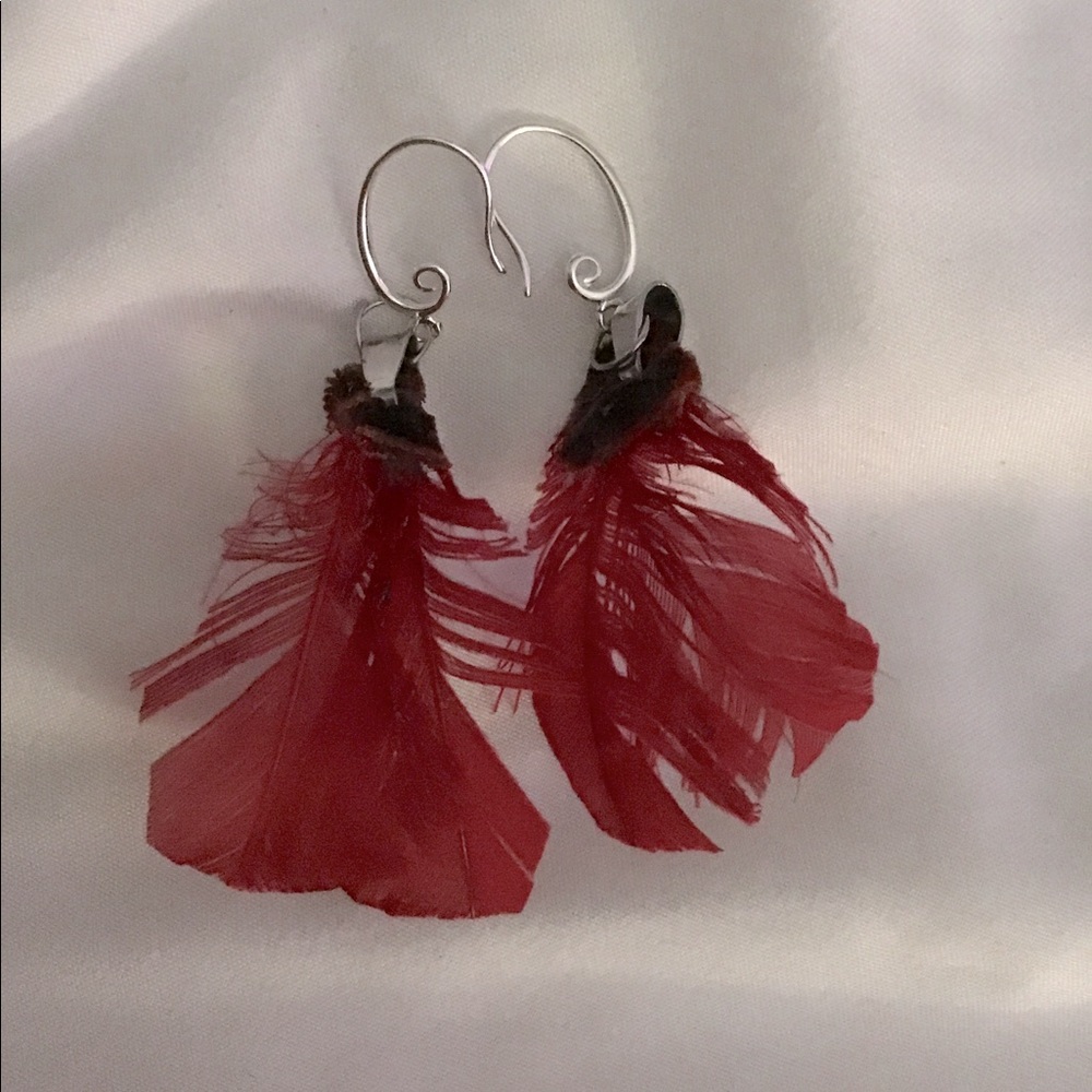 Red feather earrings with velvet and sterling silver French hooks.